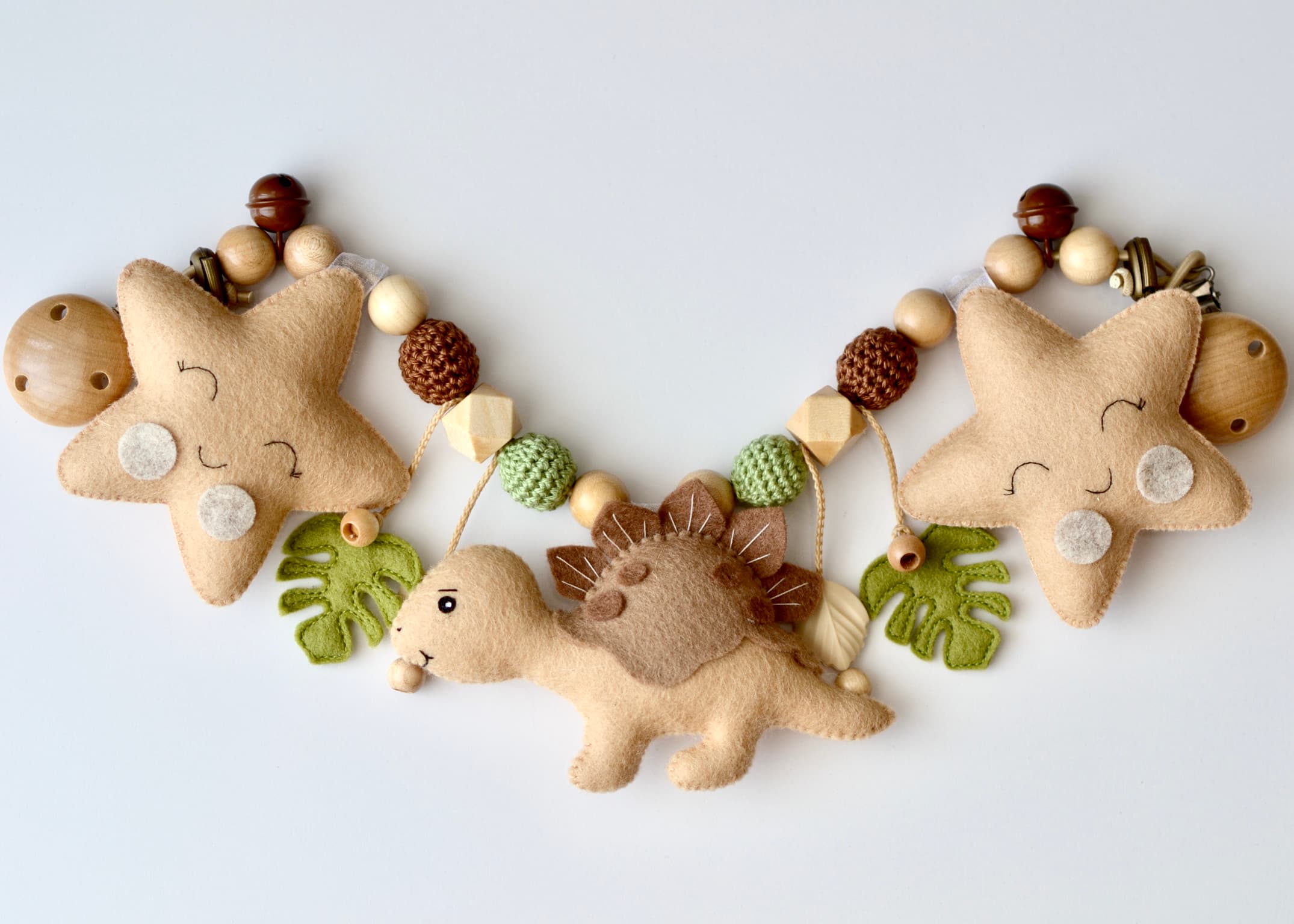 Kinderwagenkette Dino Braun mit Sternen